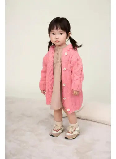 Manteau en tricot à câble Stella avec capuche